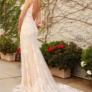 Long lace embellished Bridal Gown